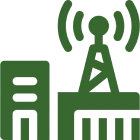 Green tower and building silhouette
