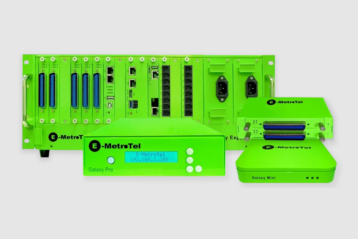 Green industrial automation equipment with control modules and a handheld device.